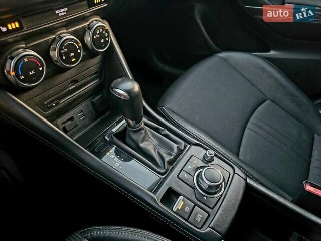 Синий Мазда СХ-3, объемом двигателя 1.8 л и пробегом 86 тыс. км за 21999 $, фото 42 на Automoto.ua