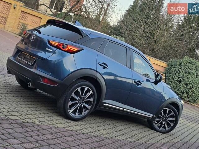 Синий Мазда СХ-3, объемом двигателя 1.8 л и пробегом 86 тыс. км за 21999 $, фото 3 на Automoto.ua