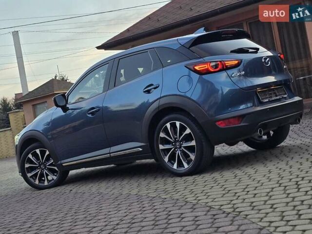 Синий Мазда СХ-3, объемом двигателя 1.8 л и пробегом 86 тыс. км за 21999 $, фото 5 на Automoto.ua
