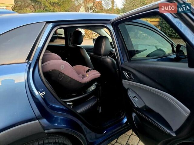 Синий Мазда СХ-3, объемом двигателя 1.8 л и пробегом 86 тыс. км за 21999 $, фото 56 на Automoto.ua