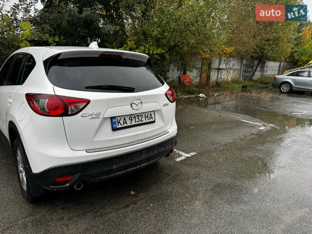 Білий Мазда СХ-5, об'ємом двигуна 2.49 л та пробігом 140 тис. км за 12000 $, фото 12 на Automoto.ua