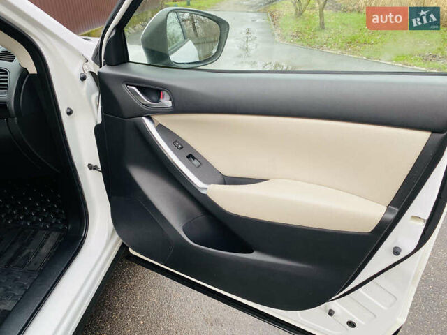 Белый Мазда СХ-5, объемом двигателя 2 л и пробегом 176 тыс. км за 11200 $, фото 12 на Automoto.ua