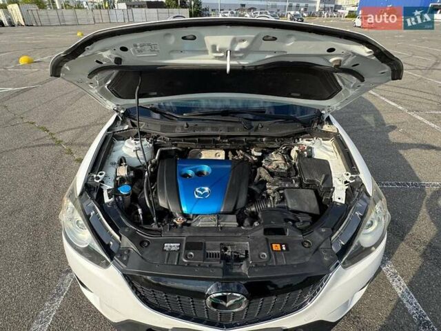 Белый Мазда СХ-5, объемом двигателя 2 л и пробегом 217 тыс. км за 13700 $, фото 50 на Automoto.ua