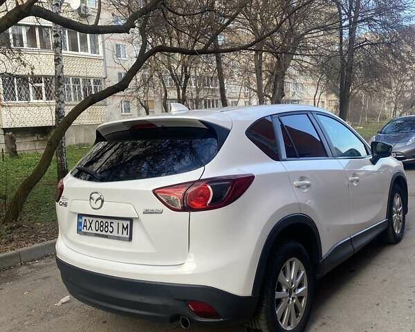 Білий Мазда СХ-5, об'ємом двигуна 2 л та пробігом 176 тис. км за 11000 $, фото 5 на Automoto.ua