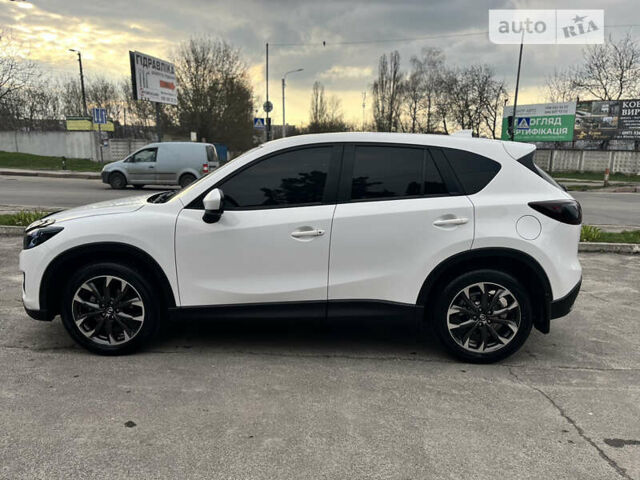 Белый Мазда СХ-5, объемом двигателя 2 л и пробегом 115 тыс. км за 13499 $, фото 16 на Automoto.ua