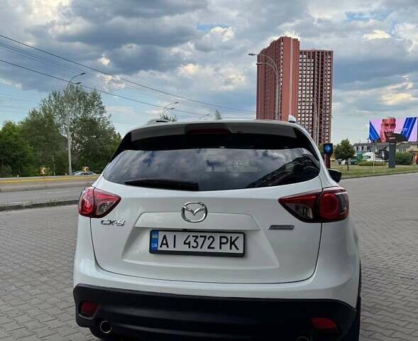 Белый Мазда СХ-5, объемом двигателя 2 л и пробегом 217 тыс. км за 14300 $, фото 4 на Automoto.ua