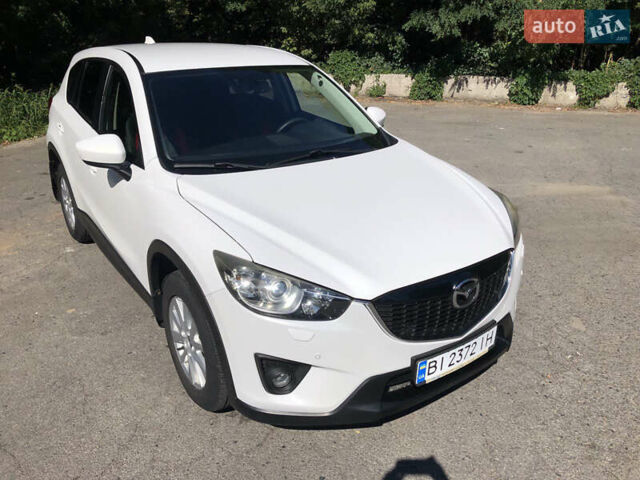 Білий Мазда СХ-5, об'ємом двигуна 2 л та пробігом 143 тис. км за 13900 $, фото 1 на Automoto.ua