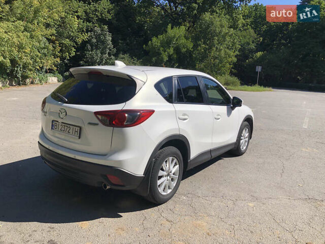 Білий Мазда СХ-5, об'ємом двигуна 2 л та пробігом 143 тис. км за 13900 $, фото 9 на Automoto.ua
