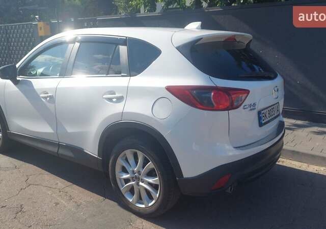 Мазда СХ-5 2012 в Ровно на Automoto.ua Белый Мазда СХ-5, объемом двигателя 2.2 л и пробегом 169 тыс. км за 15000 $, фото 7 на Automoto.ua