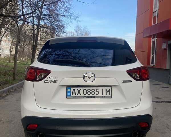 Білий Мазда СХ-5, об'ємом двигуна 2 л та пробігом 176 тис. км за 11000 $, фото 24 на Automoto.ua