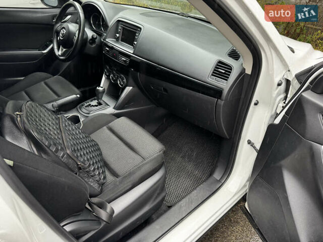 Білий Мазда СХ-5, об'ємом двигуна 2.49 л та пробігом 140 тис. км за 12000 $, фото 9 на Automoto.ua