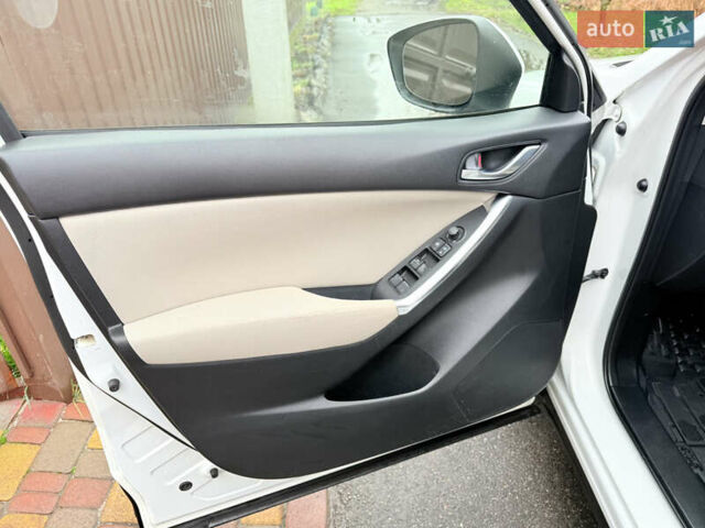 Білий Мазда СХ-5, об'ємом двигуна 2 л та пробігом 173 тис. км за 10999 $, фото 22 на Automoto.ua