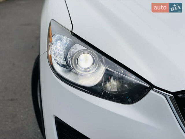 Білий Мазда СХ-5, об'ємом двигуна 2 л та пробігом 173 тис. км за 10999 $, фото 16 на Automoto.ua