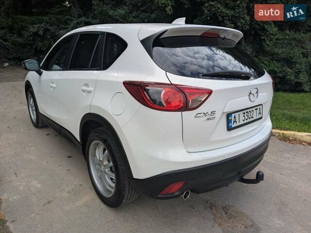 Мазда СХ-5 2012 в Киеве на Automoto.ua Белый Мазда СХ-5, объемом двигателя 2.19 л и пробегом 219 тыс. км за 13500 $, фото 10 на Automoto.ua