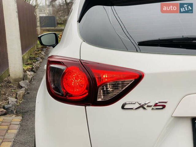 Белый Мазда СХ-5, объемом двигателя 2 л и пробегом 176 тыс. км за 11200 $, фото 8 на Automoto.ua