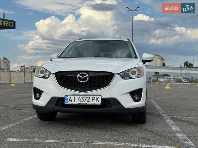 Белый Мазда СХ-5, объемом двигателя 2 л и пробегом 217 тыс. км за 13700 $, фото 10 на Automoto.ua