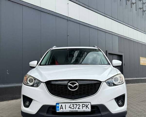Белый Мазда СХ-5, объемом двигателя 2 л и пробегом 217 тыс. км за 14300 $, фото 1 на Automoto.ua