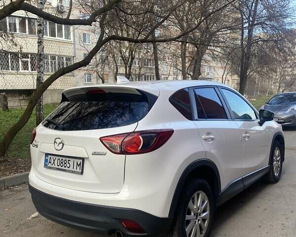 Білий Мазда СХ-5, об'ємом двигуна 2 л та пробігом 176 тис. км за 11000 $, фото 1 на Automoto.ua