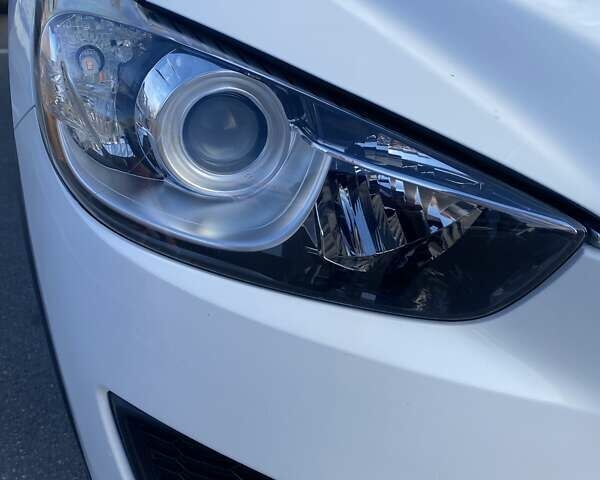 Білий Мазда СХ-5, об'ємом двигуна 2 л та пробігом 176 тис. км за 11000 $, фото 15 на Automoto.ua