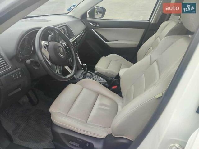 Мазда СХ-5 2013 в Бару на Automoto.ua Белый Мазда СХ-5, объемом двигателя 2.2 л и пробегом 175 тыс. км за 14000 $, фото 12 на Automoto.ua