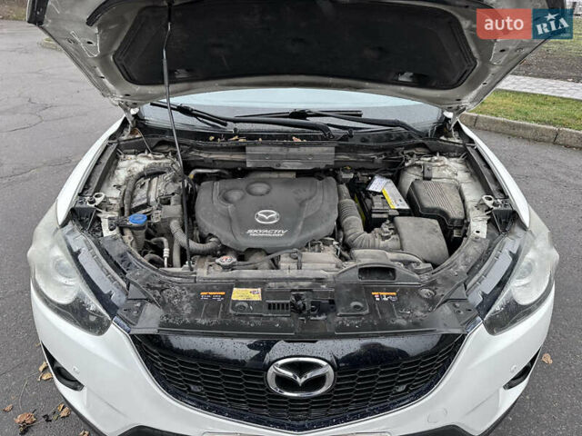 Белый Мазда СХ-5, объемом двигателя 2.19 л и пробегом 248 тыс. км за 13500 $, фото 16 на Automoto.ua