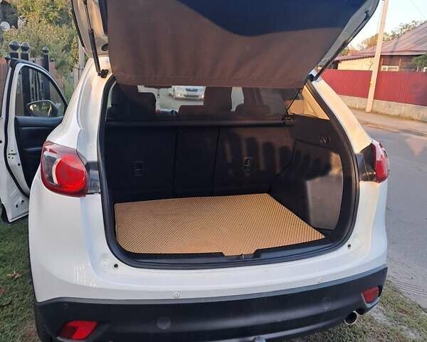 Білий Мазда СХ-5, об'ємом двигуна 2.19 л та пробігом 230 тис. км за 13000 $, фото 8 на Automoto.ua