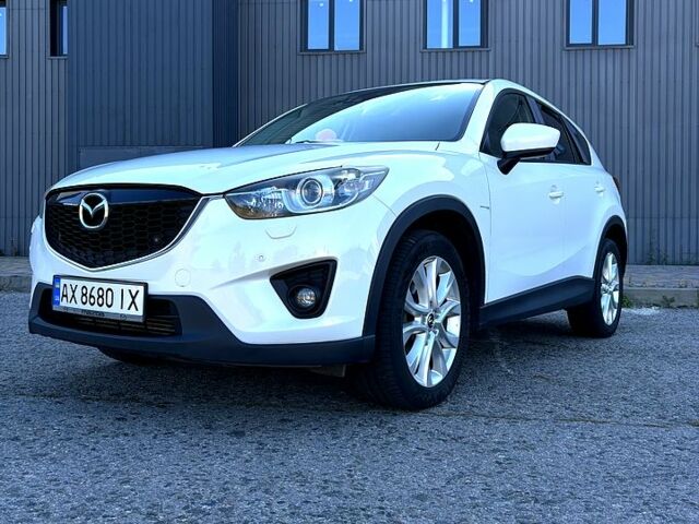 Белый Мазда СХ-5, объемом двигателя 2.2 л и пробегом 159 тыс. км за 14200 $, фото 1 на Automoto.ua
