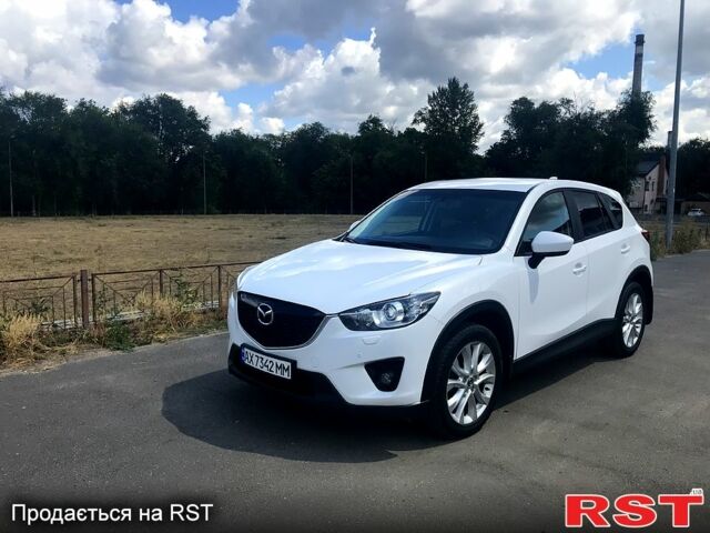 Белый Мазда СХ-5, объемом двигателя 2 л и пробегом 160 тыс. км за 14999 $, фото 1 на Automoto.ua