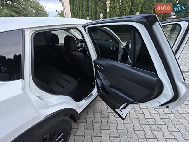 Белый Мазда СХ-5, объемом двигателя 2.2 л и пробегом 230 тыс. км за 11300 $, фото 68 на Automoto.ua