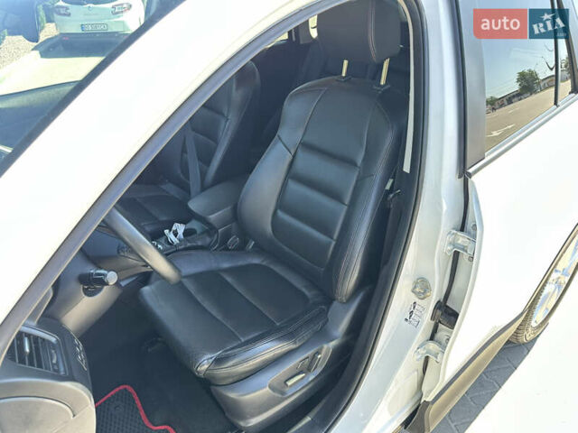 Белый Мазда СХ-5, объемом двигателя 2.19 л и пробегом 215 тыс. км за 13400 $, фото 26 на Automoto.ua