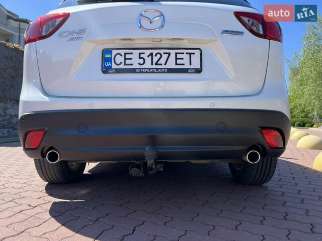 Белый Мазда СХ-5, объемом двигателя 2.19 л и пробегом 175 тыс. км за 13500 $, фото 44 на Automoto.ua
