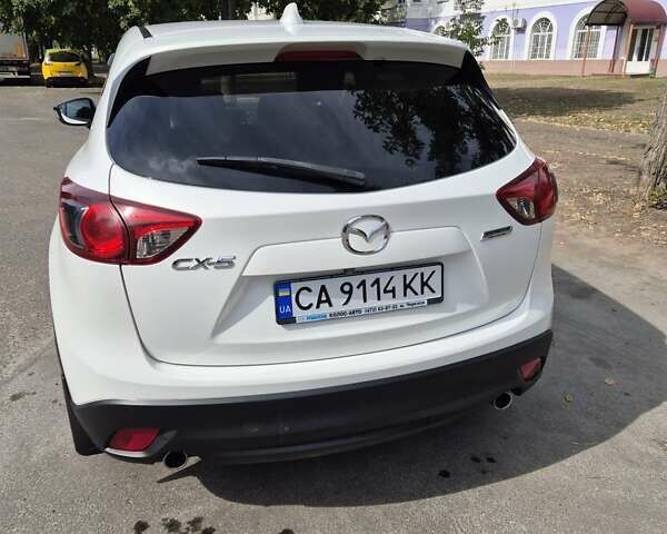 Белый Мазда СХ-5, объемом двигателя 2 л и пробегом 206 тыс. км за 15000 $, фото 5 на Automoto.ua