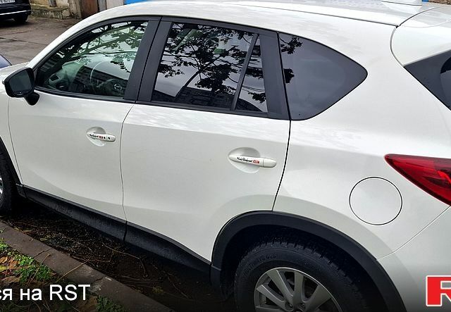 Белый Мазда СХ-5, объемом двигателя 2.5 л и пробегом 192 тыс. км за 13500 $, фото 6 на Automoto.ua