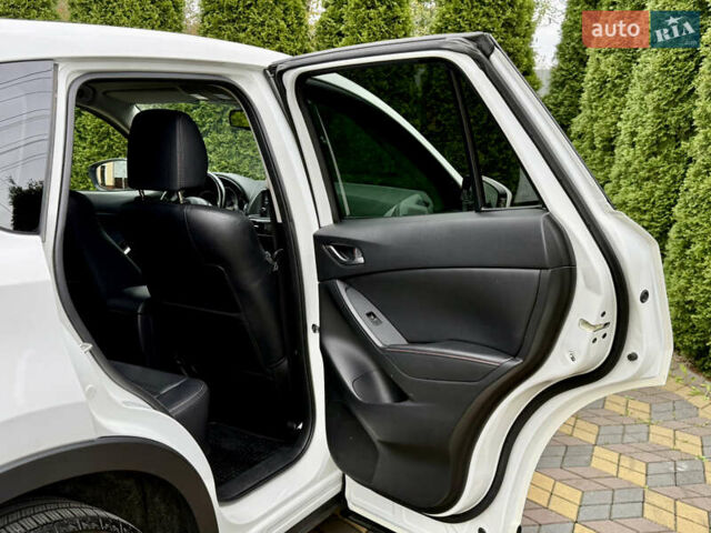 Білий Мазда СХ-5, об'ємом двигуна 2.2 л та пробігом 194 тис. км за 13800 $, фото 32 на Automoto.ua