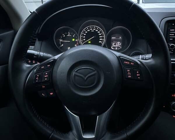 Білий Мазда СХ-5, об'ємом двигуна 2.2 л та пробігом 235 тис. км за 14500 $, фото 32 на Automoto.ua