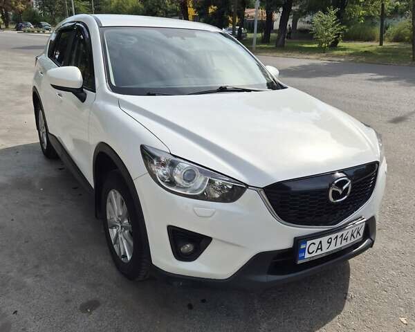 Белый Мазда СХ-5, объемом двигателя 2 л и пробегом 206 тыс. км за 15000 $, фото 4 на Automoto.ua