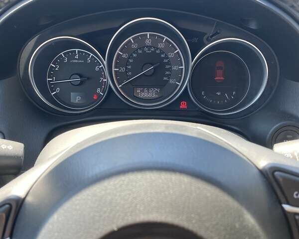 Белый Мазда СХ-5, объемом двигателя 2.49 л и пробегом 140 тыс. км за 14000 $, фото 10 на Automoto.ua