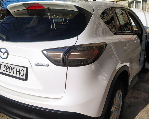 Белый Мазда СХ-5, объемом двигателя 2.49 л и пробегом 130 тыс. км за 13000 $, фото 8 на Automoto.ua