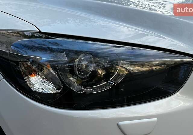 Белый Мазда СХ-5, объемом двигателя 2.49 л и пробегом 185 тыс. км за 17800 $, фото 1 на Automoto.ua