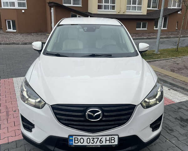 Белый Мазда СХ-5, объемом двигателя 2.19 л и пробегом 247 тыс. км за 15800 $, фото 3 на Automoto.ua