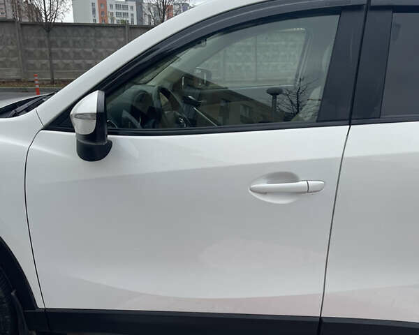 Белый Мазда СХ-5, объемом двигателя 2.19 л и пробегом 247 тыс. км за 15800 $, фото 17 на Automoto.ua