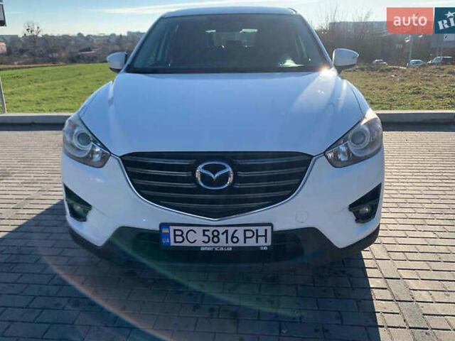 Белый Мазда СХ-5, объемом двигателя 2.49 л и пробегом 104 тыс. км за 13600 $, фото 2 на Automoto.ua