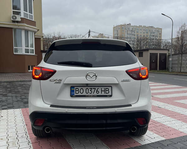 Белый Мазда СХ-5, объемом двигателя 2.19 л и пробегом 247 тыс. км за 15800 $, фото 14 на Automoto.ua