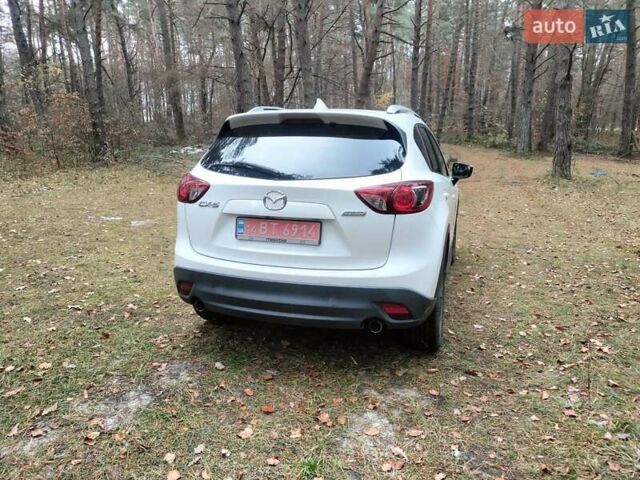 Белый Мазда СХ-5, объемом двигателя 2.5 л и пробегом 167 тыс. км за 14999 $, фото 2 на Automoto.ua