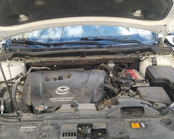 Белый Мазда СХ-5, объемом двигателя 2.49 л и пробегом 130 тыс. км за 13000 $, фото 6 на Automoto.ua