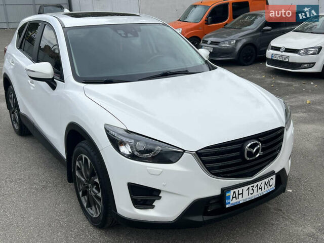 Белый Мазда СХ-5, объемом двигателя 2.49 л и пробегом 130 тыс. км за 17900 $, фото 2 на Automoto.ua