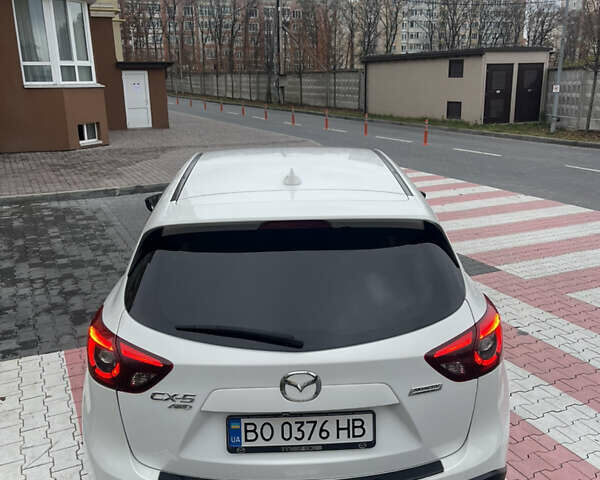Белый Мазда СХ-5, объемом двигателя 2.19 л и пробегом 247 тыс. км за 15800 $, фото 13 на Automoto.ua