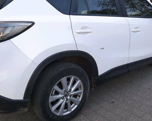 Белый Мазда СХ-5, объемом двигателя 2.49 л и пробегом 130 тыс. км за 13000 $, фото 1 на Automoto.ua