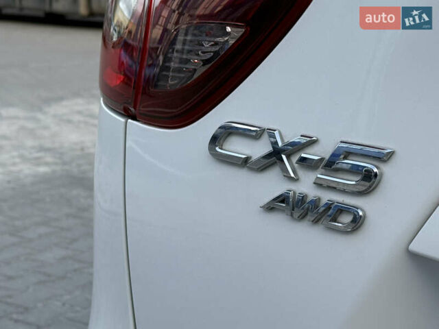 Білий Мазда СХ-5, об'ємом двигуна 2.2 л та пробігом 183 тис. км за 15999 $, фото 25 на Automoto.ua