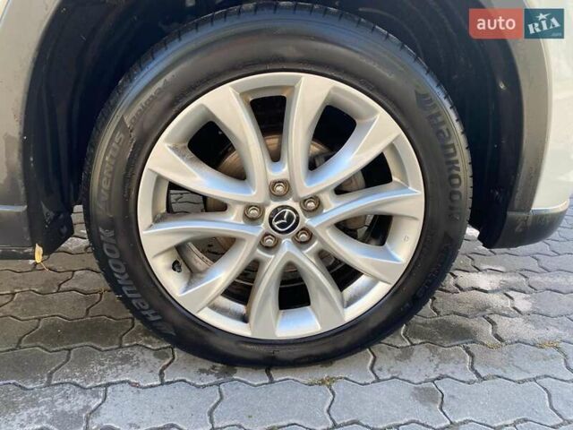 Білий Мазда СХ-5, об'ємом двигуна 2.49 л та пробігом 135 тис. км за 14000 $, фото 9 на Automoto.ua